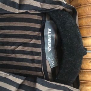 Alembika dress. Black and brown striped striped.